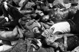 © Paolo Pellegrin/Magnum Photos, Eritrean migrants, who were rescued at sea by a ship hired by MSF. Médecines sans Frontières are seen on deck as the ship transports them to Reggio Calabria, Italy, on July 27, 2015 © Paolo Pellegrin/Magnum Photos, Eritrean migrants, who were rescued at sea by a ship hired by MSF. Médecines sans Frontières are seen on deck as the ship transports them to Reggio Calabria, Italy, on July 27, 2015